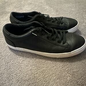Men’s black leather Tom’s size 9